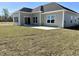 Home showcasing sliding glass doors, windows, and a concrete patio at 217 Shady Pines Ct., Conway, SC 29527