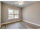 Neutral bedroom with a large window providing ample natural light at 217 Shady Pines Ct., Conway, SC 29527
