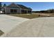 A large concrete driveway leading up to an inviting single-story home, highlighting outdoor space at 217 Shady Pines Ct., Conway, SC 29527