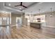 Open-concept living space with views of the kitchen and entryway, featuring modern lighting at 217 Shady Pines Ct., Conway, SC 29527