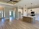 Open floorplan living area with a kitchen island and a view of the entry way at 217 Shady Pines Ct., Conway, SC 29527