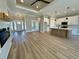 Open floorplan living area with a kitchen island and a view of the entry way at 217 Shady Pines Ct., Conway, SC 29527