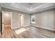 Large main bedroom with wood-look flooring, and neutral walls at 217 Shady Pines Ct., Conway, SC 29527
