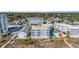 Aerial view of a beachside condo complex with a pool and parking at 2405 S Ocean Blvd. # 306, North Myrtle Beach, SC 29582