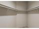 Walk-in closet featuring white shelving and ample storage space at 866 Foxtail Dr. # C-34, Longs, SC 29568
