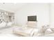 Bright living room with modern decor, ceiling fan, and kitchen in the background at 866 Foxtail Dr. # C-34, Longs, SC 29568