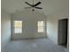 An unfinished bedroom features high ceilings, and dual windows at 1009 Jase Dr., Longs, SC 29568