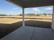 Covered patio looking out over a sprawling yard, offering a serene view of the surrounding landscape at 1009 Jase Dr., Longs, SC 29568