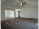Bright and airy living room with high ceilings leads to the entryway at 1009 Jase Dr., Longs, SC 29568