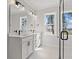 Bathroom with double vanity and walk-in shower featuring black trim at 1101 Anne St., North Myrtle Beach, SC 29582
