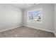 Neutral bedroom with plush carpet and natural light at 1101 Anne St., North Myrtle Beach, SC 29582
