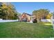 Spacious backyard featuring lush green grass and privacy fence at 305 Duel Ct., Myrtle Beach, SC 29588
