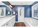 Elegant bathroom with dual sinks, a soaking tub, and modern fixtures for a spa-like experience at 305 Duel Ct., Myrtle Beach, SC 29588