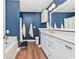 Stylish bathroom featuring dual sinks, white vanities, and a separate tub area with modern accents at 305 Duel Ct., Myrtle Beach, SC 29588