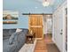Inviting entryway features a striking wooden barn door, stylish accents, and durable wood flooring for a modern and welcoming entrance at 305 Duel Ct., Myrtle Beach, SC 29588