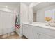 Well-lit bathroom featuring a vanity with double sinks and a shower-tub combination at 62 S Reindeer Rd., Surfside Beach, SC 29575