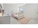 Neutral bedroom with a ceiling fan, a window and a comfortable bed at 62 S Reindeer Rd., Surfside Beach, SC 29575