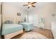 Bright bedroom with two twin beds and coastal-themed decor at 76 Eagle Pass Dr., Murrells Inlet, SC 29576
