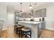 Kitchen with granite island, stainless appliances, pendant lighting and seating for three at 76 Eagle Pass Dr., Murrells Inlet, SC 29576