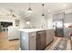 Kitchen island features a stainless dishwasher, a sink and granite countertops at 76 Eagle Pass Dr., Murrells Inlet, SC 29576