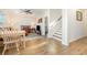 Open-concept living room featuring a dining area, a comfortable living space, and stairs at 76 Eagle Pass Dr., Murrells Inlet, SC 29576