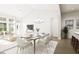 Open concept dining room with adjacent living room at 874 Foxtail Dr. # C-36, Longs, SC 29568