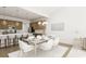 Elegant dining room with white chairs and a marble table at 874 Foxtail Dr. # C-36, Longs, SC 29568