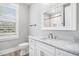 The bathroom features a marble-look countertop and vanity with stylish fixtures at 1201 Surf Pointe Dr., North Myrtle Beach, SC 29582