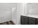 Modern bathroom with dark vanity and a shower at 197 Six Mile Creek Dr., Georgetown, SC 29440