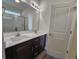 Bathroom features a dual sink vanity, a framed mirror, and recessed lighting at 2770 Daisy Rd., Loris, SC 29569