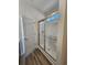 Modern shower stall featuring clear glass doors, and a tile surround at 2770 Daisy Rd., Loris, SC 29569