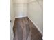 Spacious walk-in closet featuring wall-mounted shelving and carpeted floors at 2770 Daisy Rd., Loris, SC 29569
