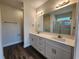Bathroom with double vanity, framed mirrors, and recessed lighting at 2808 Daisy Rd., Loris, SC 29569