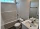 Clean bathroom with a shower-tub combo, a toilet, and a vanity with sink and mirror at 2814 Daisy Rd., Loris, SC 29569