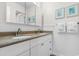 Double vanity bathroom with granite countertop and good lighting at 597 Blue River Ct. # 2F, Myrtle Beach, SC 29579