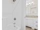 Clean bathroom with shower/tub combo and white vanity at 597 Blue River Ct. # 2F, Myrtle Beach, SC 29579