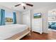 Spacious bedroom with a queen bed and dresser at 597 Blue River Ct. # 2F, Myrtle Beach, SC 29579