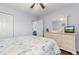 Bedroom with dresser, double bed, and TV at 597 Blue River Ct. # 2F, Myrtle Beach, SC 29579