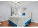 Bedroom with double bed, nightstand, and wood floors at 597 Blue River Ct. # 2F, Myrtle Beach, SC 29579