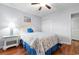 Bedroom with double bed, nightstand and wood floors at 597 Blue River Ct. # 2F, Myrtle Beach, SC 29579