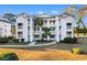 Inviting 3-story building with ample parking and landscaping at 597 Blue River Ct. # 2F, Myrtle Beach, SC 29579