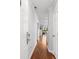 Bright hallway with hardwood floors leading to living area at 597 Blue River Ct. # 2F, Myrtle Beach, SC 29579