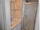 Well-lit bathroom featuring a shower with glass doors, modern fixtures and a sink at 100 G Myrtle Greens Dr. # G, Conway, SC 29526