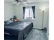 This bedroom features a window, a bed with plush pillows, and a cozy atmosphere at 100 G Myrtle Greens Dr. # G, Conway, SC 29526