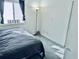 Cozy bedroom with carpeted floor, a lamp, and a window, creating a comfortable and inviting space at 100 G Myrtle Greens Dr. # G, Conway, SC 29526