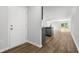 Inviting entryway with views of a modern kitchen and a bright living space at 1044 Kinness Dr., Conway, SC 29527