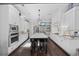 Modern kitchen with granite countertops, stainless steel appliances, and a large center island at 158 Knotty Pine Way, Murrells Inlet, SC 29576