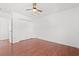 Bedroom with hardwood floors, closet, and ceiling fan at 2053 Haystack Way, Myrtle Beach, SC 29579