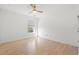 Empty bedroom features hardwood floors, natural light, and a ceiling fan at 2053 Haystack Way, Myrtle Beach, SC 29579