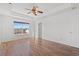 Spacious bedroom with hardwood floors and a large window offering plenty of natural light at 2053 Haystack Way, Myrtle Beach, SC 29579